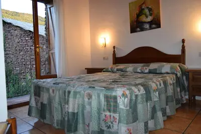 Cama o camas de una habitación en Ca L'Emili