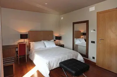 Cama o camas de una habitación en Hotel Restaurante Revestido