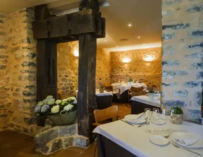 Un restaurante o sitio para comer en Ligüerre Resort
