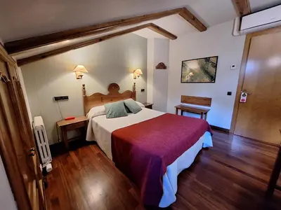 Cama o camas de una habitación en Hotel Aragüells