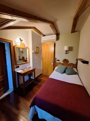 Cama o camas de una habitación en Hotel Aragüells