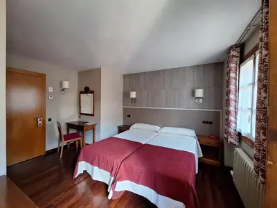Cama o camas de una habitación en Hotel Aragüells