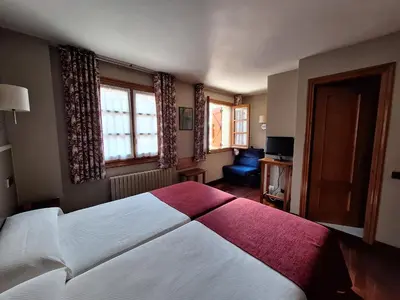 Cama o camas de una habitación en Hotel Aragüells