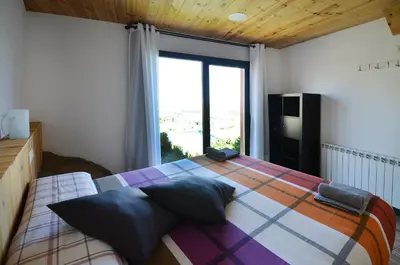 Cama o camas de una habitación en La Granja del Besa
