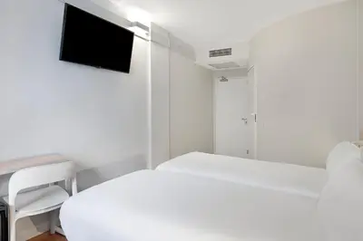 Cama o camas de una habitación en B&B HOTEL Zaragoza Centro