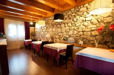 Un restaurante o sitio para comer en Hotel Diamó