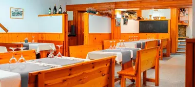 Una televisión o centro de entretenimiento en Hostal Casa Palmira