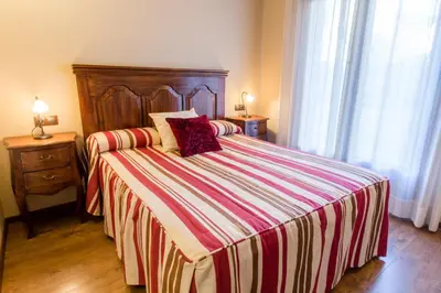 Cama o camas de una habitación en Hotel Flor De Neu