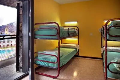 Cama o camas de una habitación en Albergue Era Garona