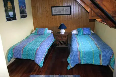 Cama o camas de una habitación en Bagergue casa aranesa