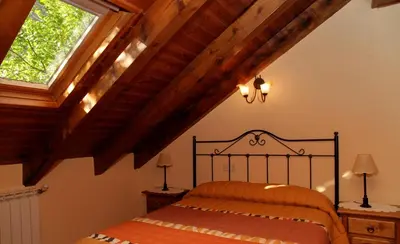 Cama o camas de una habitación en Apartaments La Llucana