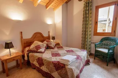 Cama o camas de una habitación en Casa Xaupi 1