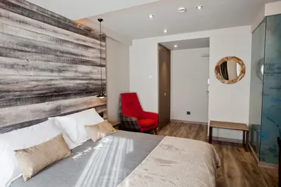 Cama o camas de una habitación en Hotel Boutique La Neu