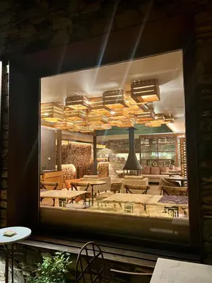 Un restaurante o sitio para comer en Hotel Boutique La Neu