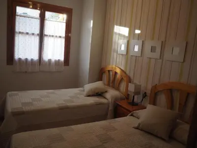Cama o camas de una habitación en Reconquista