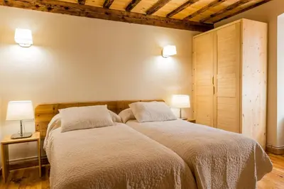 Cama o camas de una habitación en Casa Rural 