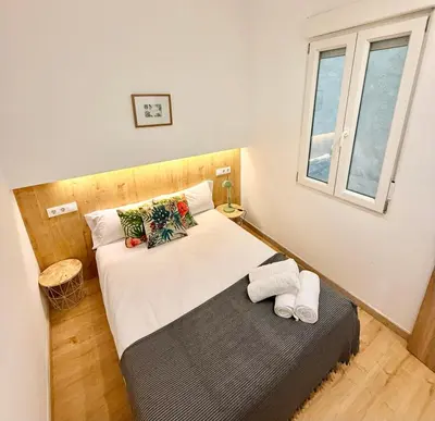 Cama o camas de una habitación en Apartamento Vive Zaragoza