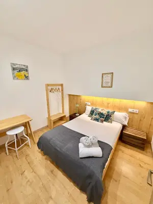 Cama o camas de una habitación en Apartamento Vive Zaragoza