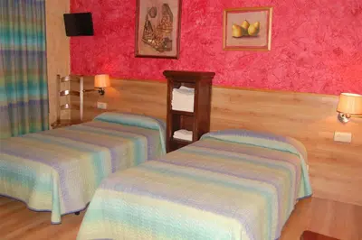 Cama o camas de una habitación en Hotel Rural Bidean