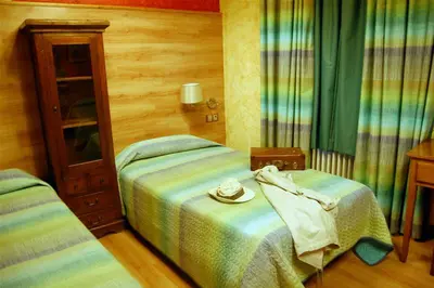 Cama o camas de una habitación en Hotel Rural Bidean