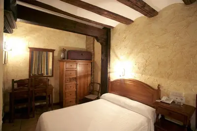 Cama o camas de una habitación en Hotel Rural Bidean