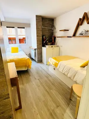 Cama o camas de una habitación en UP BENASQUE FLOR de NIEVE