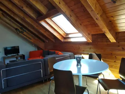 Una televisión o centro de entretenimiento en Dúplex familiar en Esterri d'Àneu