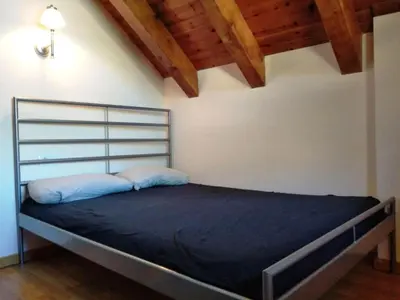 Cama o camas de una habitación en Dúplex familiar en Esterri d'Àneu