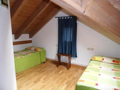 Cama o camas de una habitación en Pensió i Apartaments la Bordeta