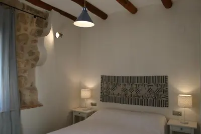 Cama o camas de una habitación en Maset del Riu