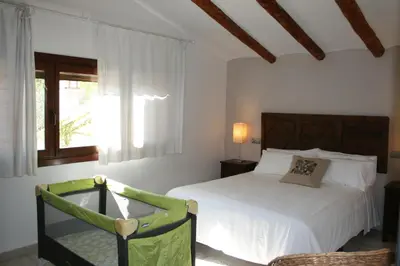 Cama o camas de una habitación en Maset del Riu