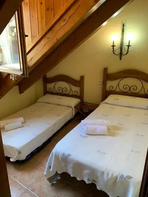 Cama o camas de una habitación en Casa Valentí