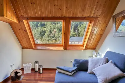 Zona de estar de Magnífico Ático Duplex con vistas a la montaña