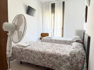 Cama o camas de una habitación en Hostel Central Zaragoza