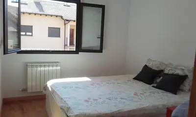 Cama o camas de una habitación en Apartamento Paola. Prepirineo. Senderismo, relax...