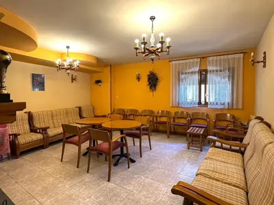 Zona de estar de Apartamentos Lausan