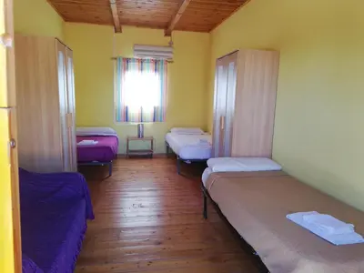 Cama o camas de una habitación en Camping La Estanca