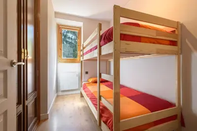 Cama o camas de una habitación en Panticosa Brazato