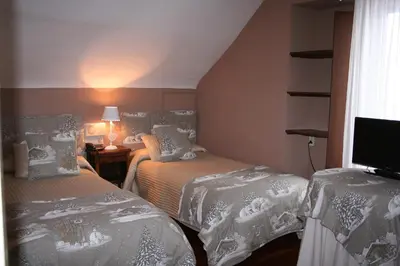 Cama o camas de una habitación en Hotel Boutique Balaitus