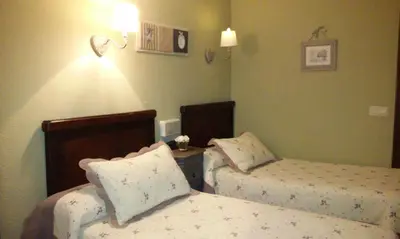 Cama o camas de una habitación en Hotel Boutique Balaitus