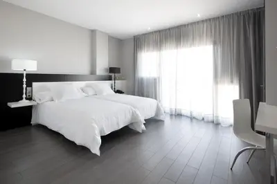 Cama o camas de una habitación en Hotel MasMonzon