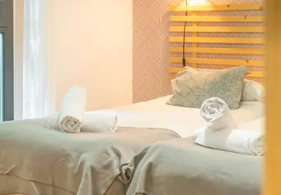 Cama o camas de una habitación en Casa Ferran, amplias habitaciones y apartamentos de montaña