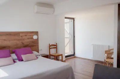 Cama o camas de una habitación en Cal Portalé - Casa de Pagès