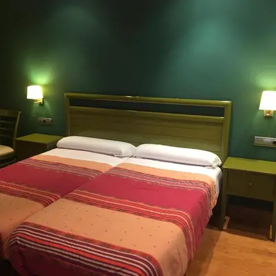 Cama o camas de una habitación en Hostal Rural Haizea