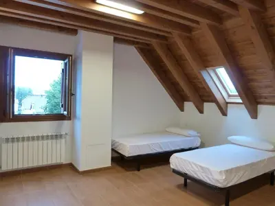Cama o camas de una habitación en Hostal Rural Haizea