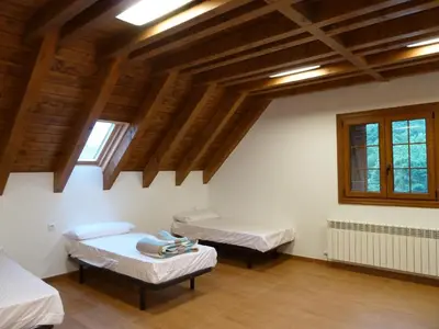 Cama o camas de una habitación en Hostal Rural Haizea