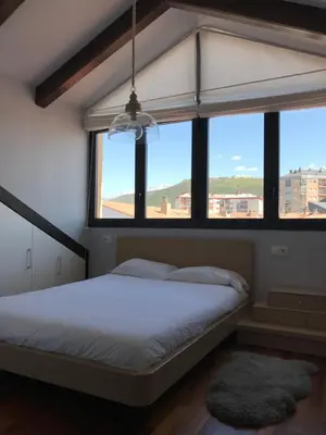 Cama o camas de una habitación en Duplex Céntrico Labati Jaca
