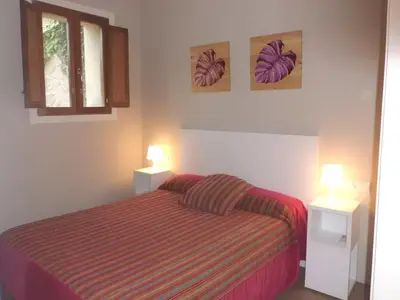 Cama o camas de una habitación en Apartamentos Bergantes