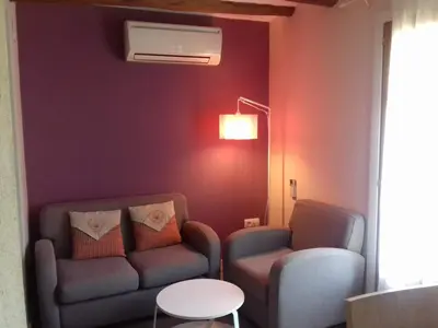 Zona de estar de Apartamentos Bergantes