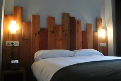 Cama o camas de una habitación en El Capricho de Arguis